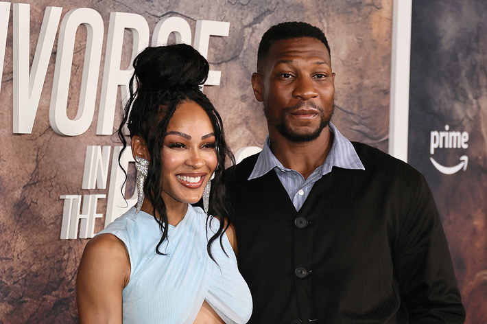 Meagan Good in a stylish cut-out gown and Jonathan Majors in a suit at a Prime event