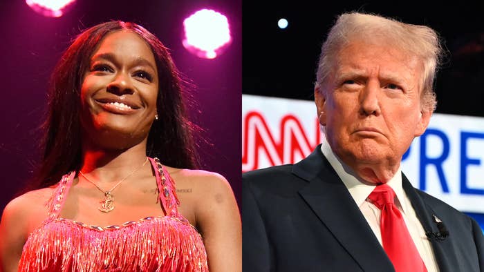 Azealia Banks in a fringed outfit onstage next to Donald Trump in a suit and red tie at an event