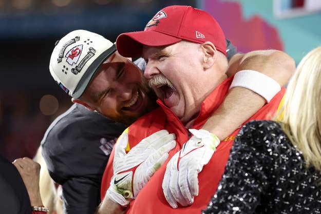 Travis Kelce and Andy Reid of the Kansas City Chiefs celebrating emotionally on the sidelines